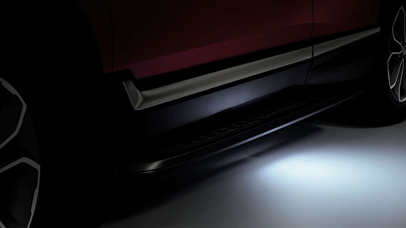 Detailní záběr osvětlení přístupu do vozidla modelu Honda CR-V Hybrid