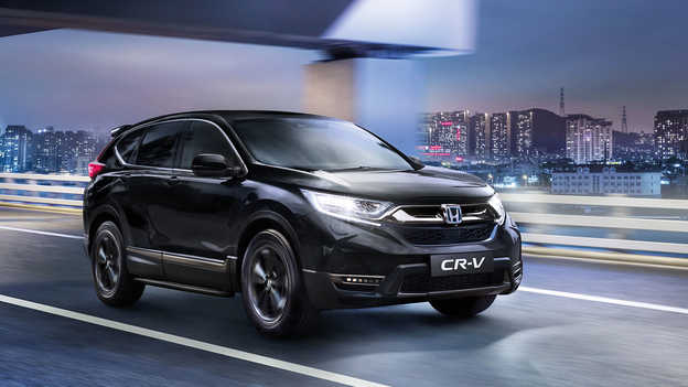 Aplikace My Honda v telefonu drženém v ruce