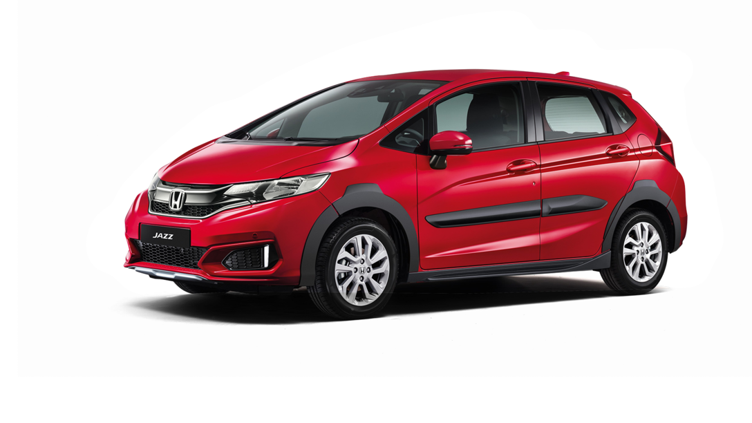 Přední tříčtvrtinový pohled zprava na model Honda Jazz X-Road. Scénický snímek.