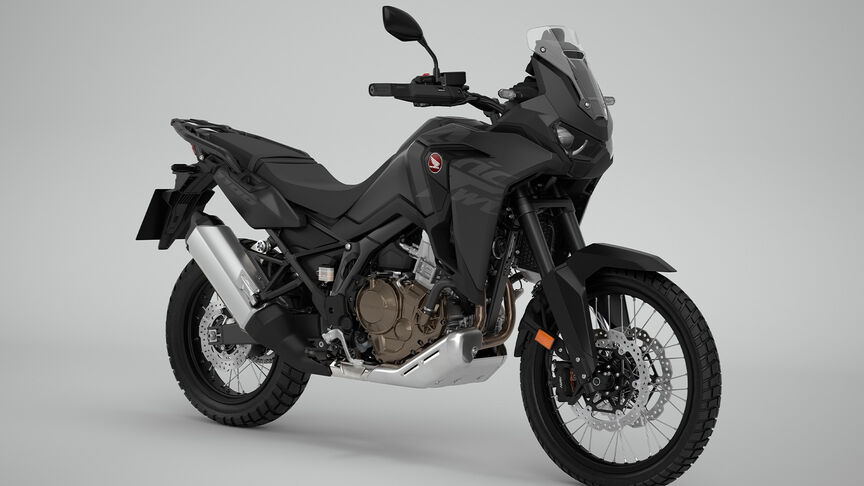 Tříčtvrtinový pohled zpředu zprava na model Honda CRF1100 Africa Twin ve studiu