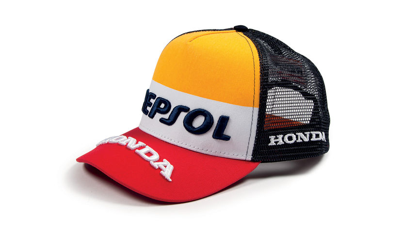 Čepice v oranžové, bílé a červené barvě týmu Honda MotoGP s logem Repsol