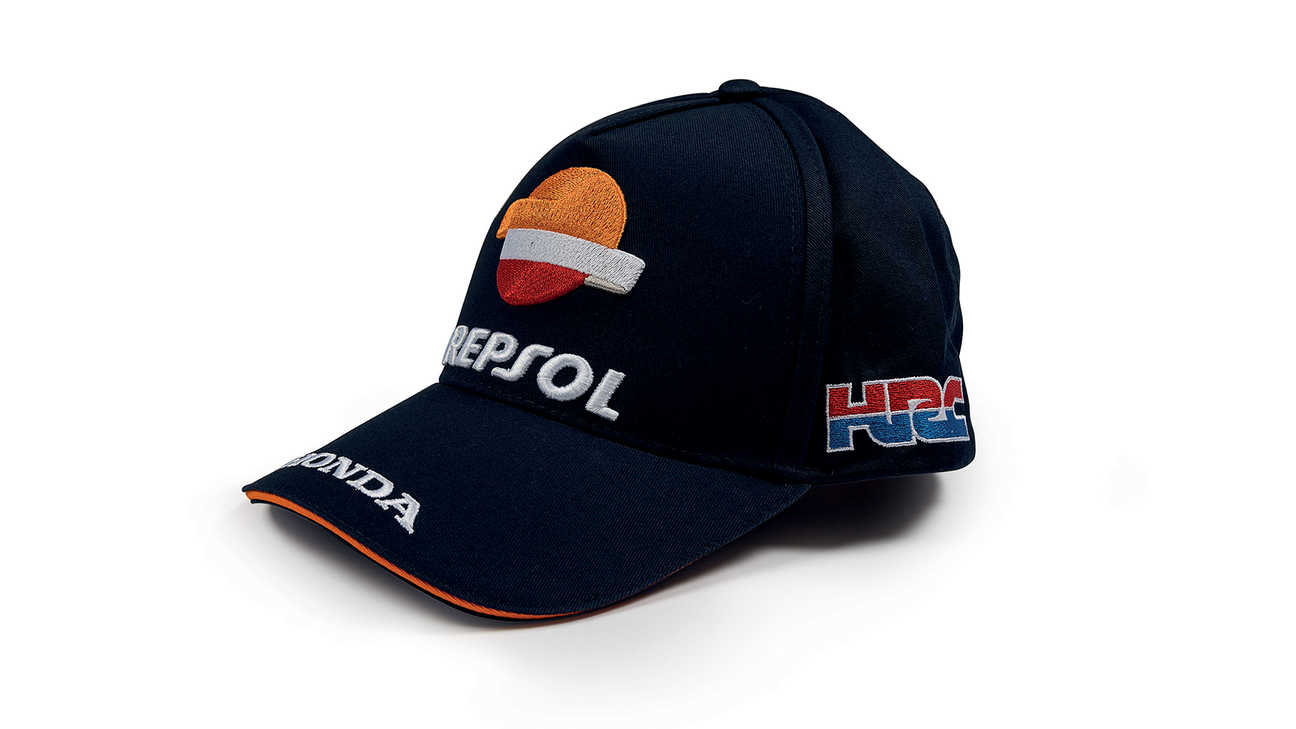 Modrá čepice v barvách týmu Honda MotoGP, s logem Repsol