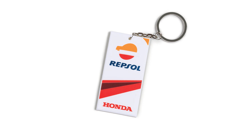 Přívěsek na klíče v barvách týmu Honda MotoGP s logem Repsol