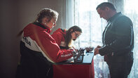 Man signing up to Honda test ride 